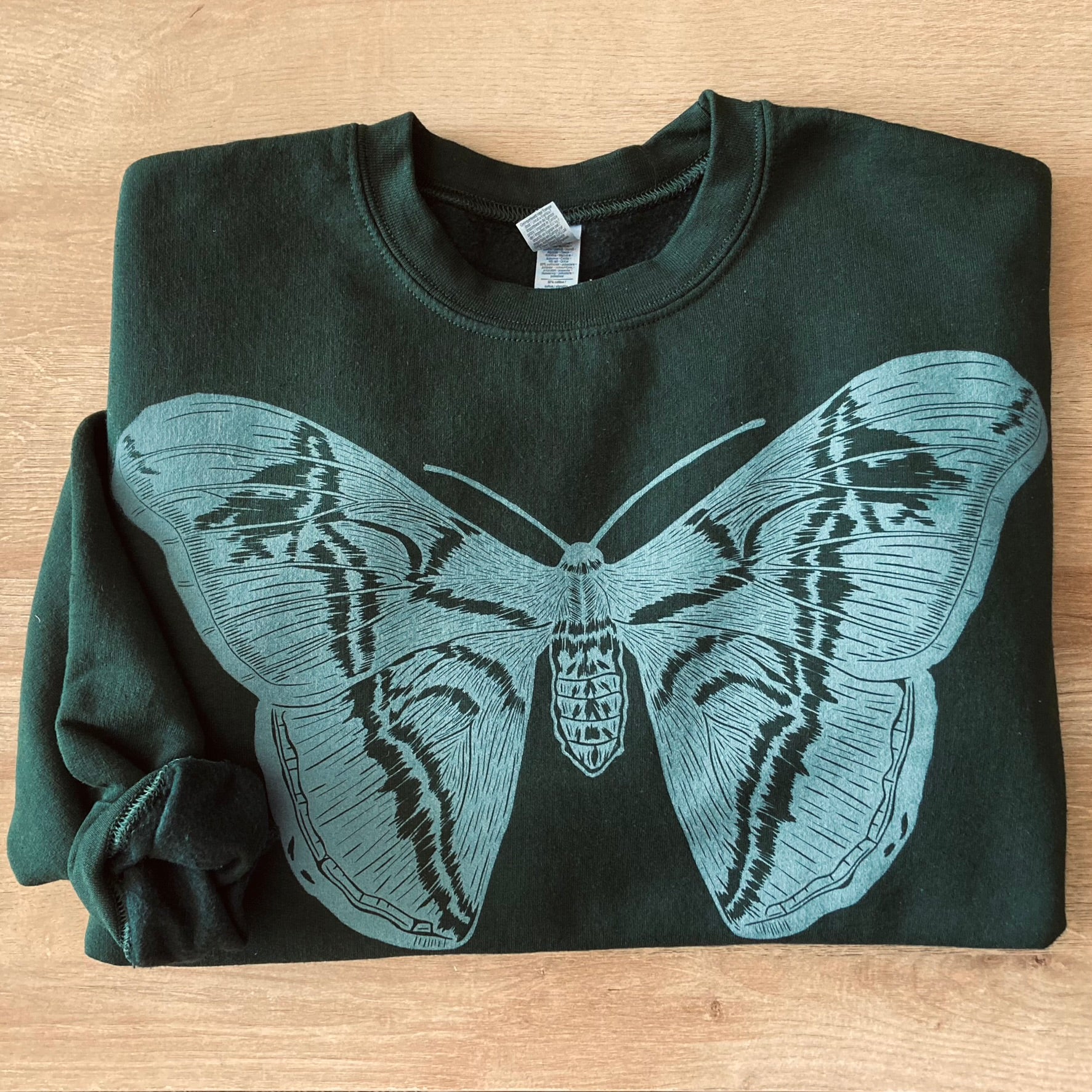 moth sweatshirt green